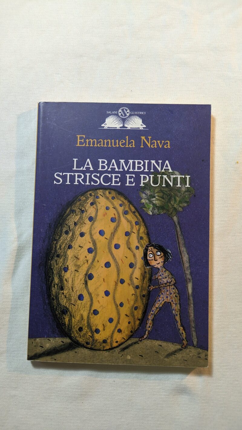 La bambina strisce e puntini
