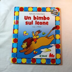 Un bimbo sul leone